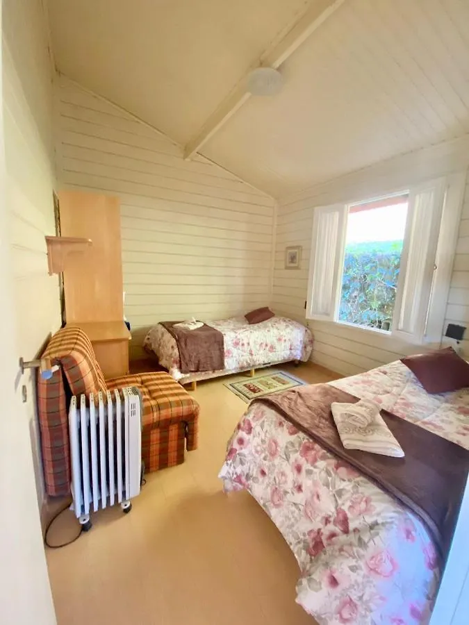 Holiday home Chale Recanto Das Flores Campos do Jordao